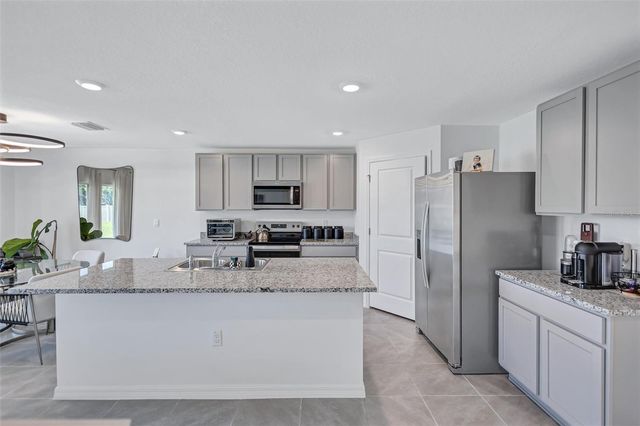 7601 ROSEWOOD GARDEN LOOP, Tampa, FL 33637