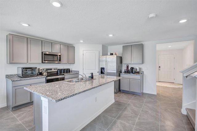 7601 ROSEWOOD GARDEN LOOP, Tampa, FL 33637
