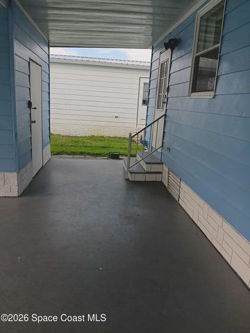 7597 Cedar Bark Road, Micco, FL 32976