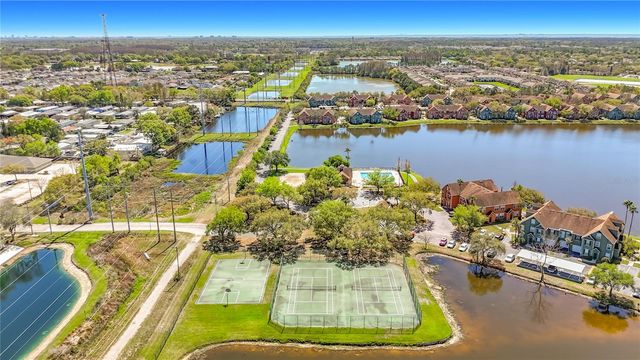 9068 LAKE CHASE ISLAND WAY 9068, Tampa, FL 33626