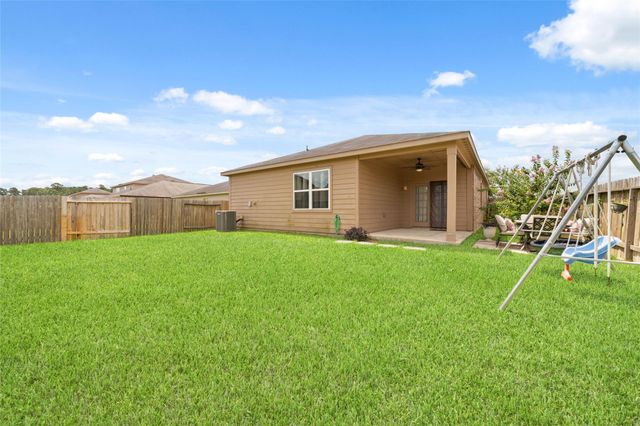 12054 Fairquarter Lane, Pinehurst, TX 77362