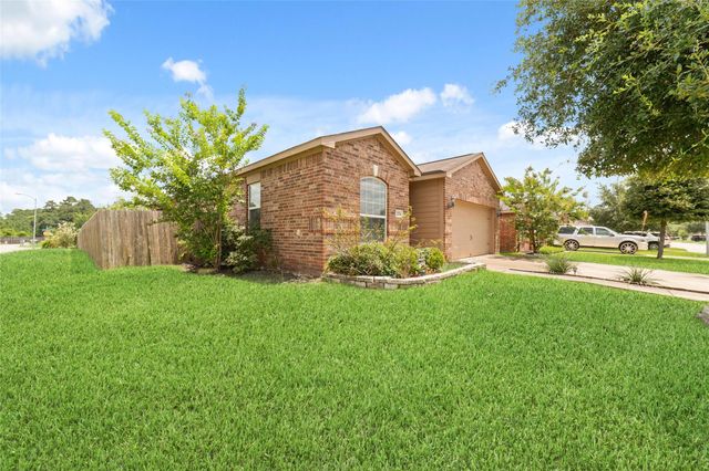 12054 Fairquarter Lane, Pinehurst, TX 77362