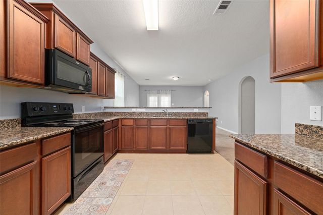 12054 Fairquarter Lane, Pinehurst, TX 77362