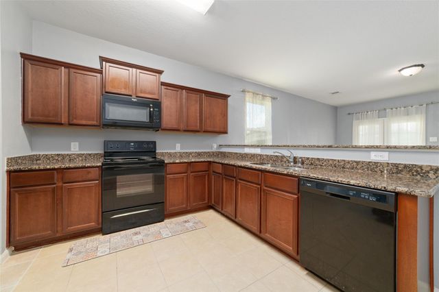 12054 Fairquarter Lane, Pinehurst, TX 77362