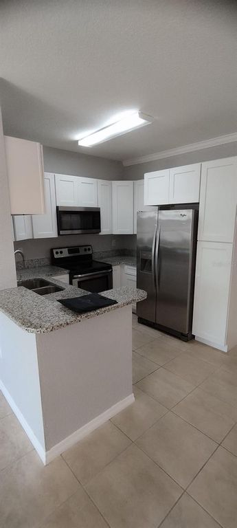 2544 ROBERT TRENT DRIVE 825, Orlando, FL 32835