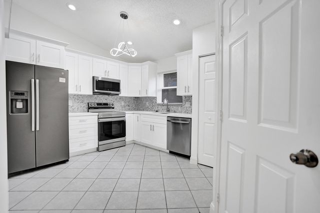 133 Caribe Court, Greenacres, FL 33413