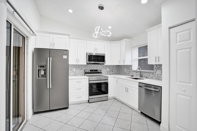 133 Caribe Court, Greenacres, FL 33413