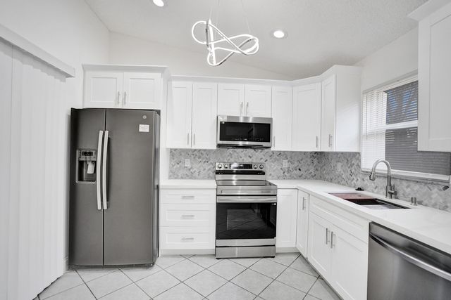 133 Caribe Court, Greenacres, FL 33413