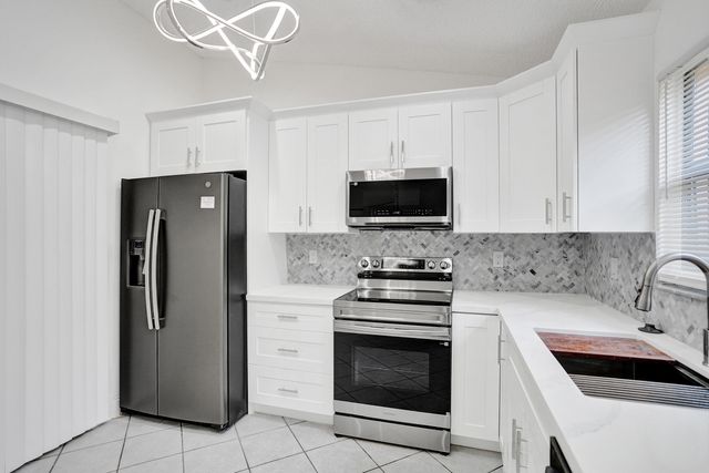 133 Caribe Court, Greenacres, FL 33413