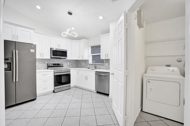 133 Caribe Court, Greenacres, FL 33413