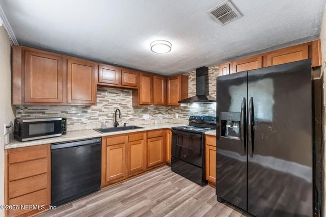 10501 WOOSTER Drive, Jacksonville, FL 32218