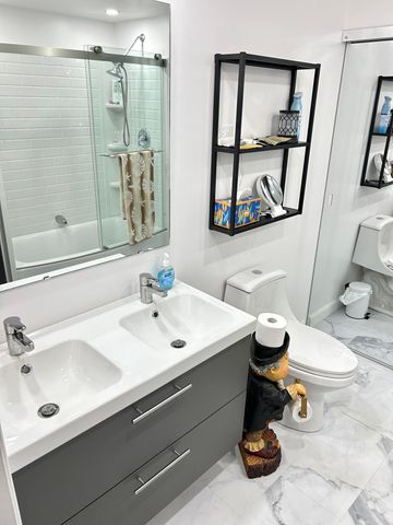 111 Alamanda Lane, Deerfield Beach, FL 33442