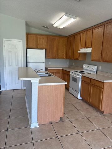 2253 MEADOW OAK CIRCLE, Kissimmee, FL 34746