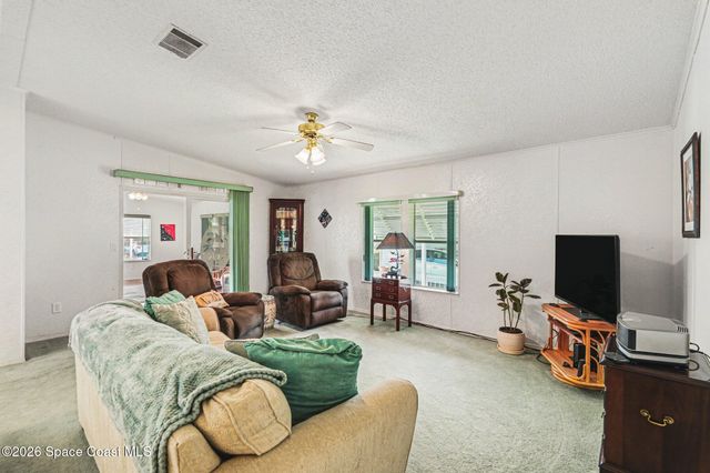 210 Kiwi Drive, Barefoot Bay, FL 32976