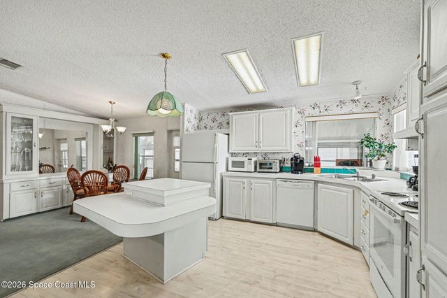 210 Kiwi Drive, Barefoot Bay, FL 32976