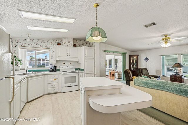 210 Kiwi Drive, Barefoot Bay, FL 32976