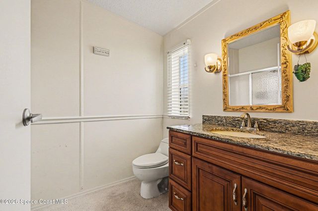 210 Kiwi Drive, Barefoot Bay, FL 32976
