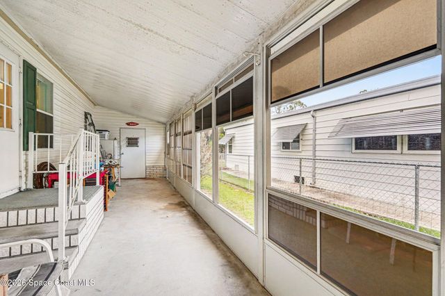 210 Kiwi Drive, Barefoot Bay, FL 32976