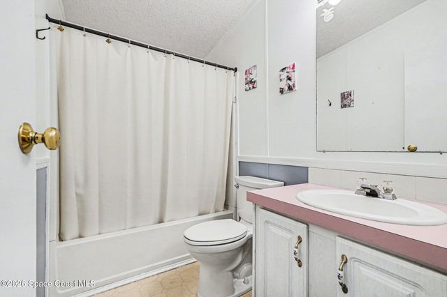 210 Kiwi Drive, Barefoot Bay, FL 32976