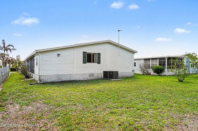 210 Kiwi Drive, Barefoot Bay, FL 32976