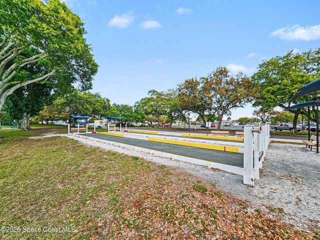 210 Kiwi Drive, Barefoot Bay, FL 32976