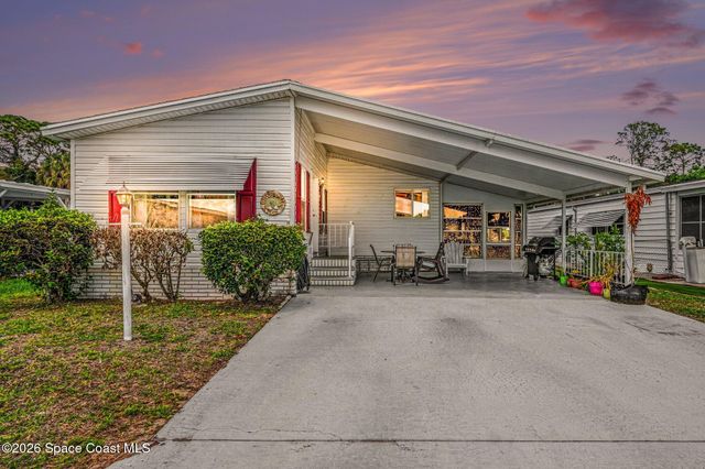 210 Kiwi Drive, Barefoot Bay, FL 32976