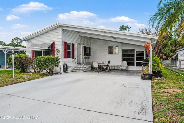 210 Kiwi Drive, Barefoot Bay, FL 32976