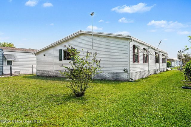 210 Kiwi Drive, Barefoot Bay, FL 32976