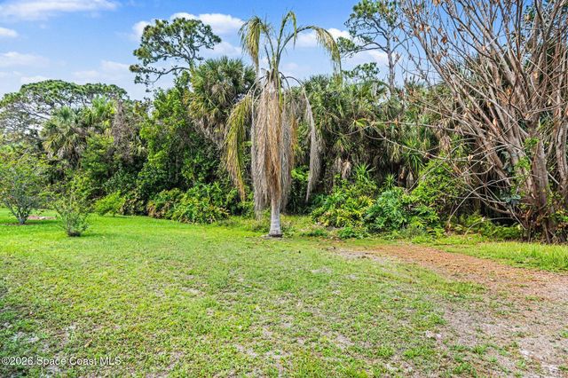 210 Kiwi Drive, Barefoot Bay, FL 32976
