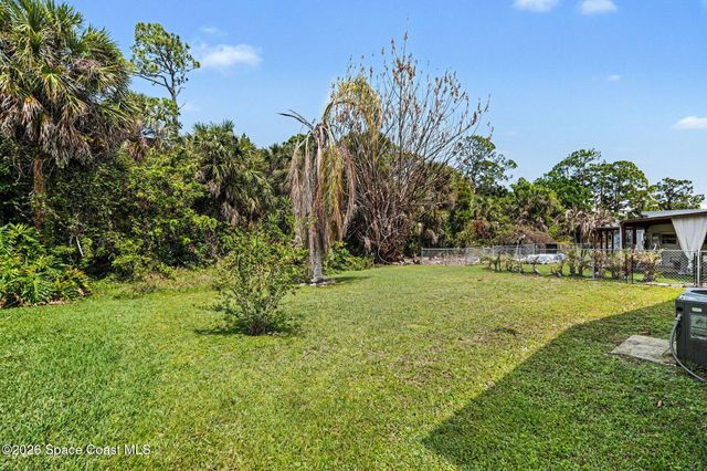 210 Kiwi Drive, Barefoot Bay, FL 32976