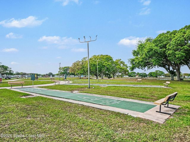 210 Kiwi Drive, Barefoot Bay, FL 32976