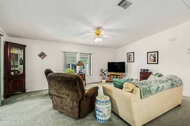 210 Kiwi Drive, Barefoot Bay, FL 32976