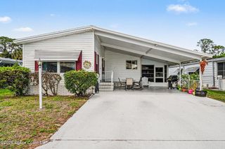 210 Kiwi Drive, Barefoot Bay, FL 32976