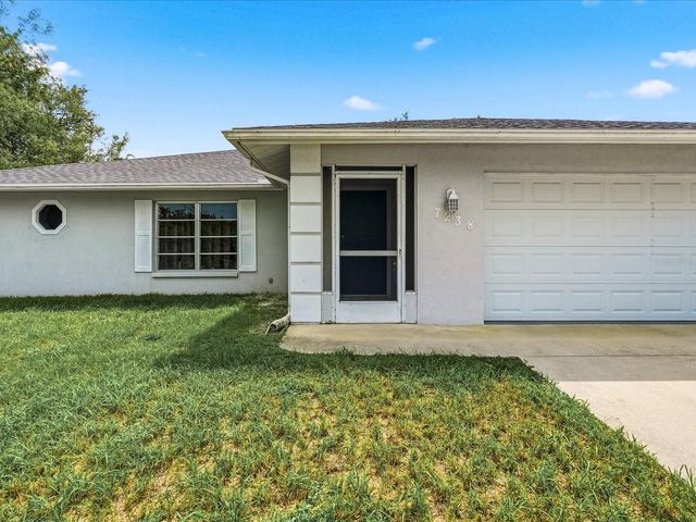 7238 SPINNAKER BOULEVARD, Englewood, FL 34224
