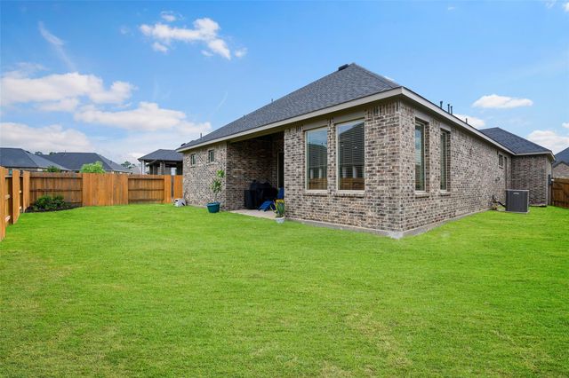 1112 Sienna Forest Lane, Pinehurst, TX 77362