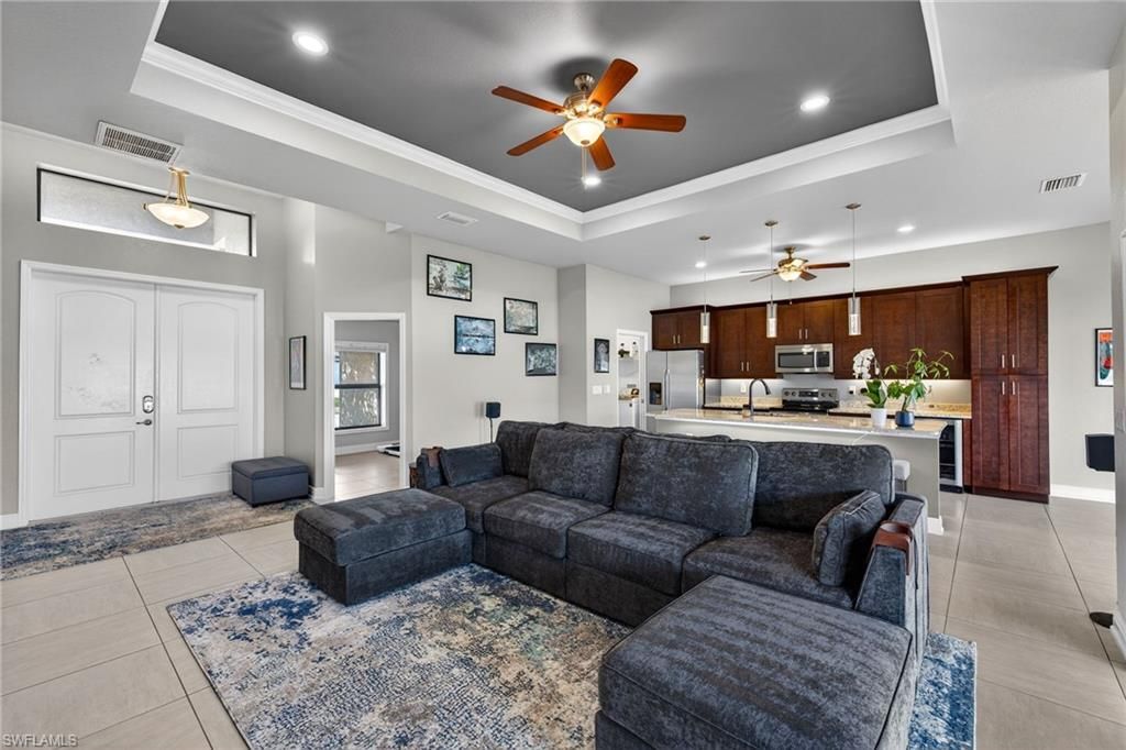 Image 8 of property listing at 1203 SW 11th PL, Cape Coral, FL 33991