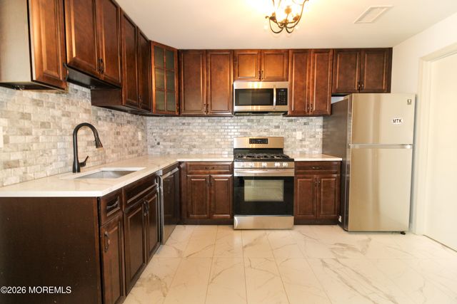 455 Hawthorne Place, Morganville, NJ 07751