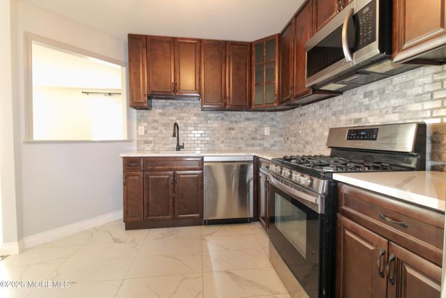 455 Hawthorne Place, Morganville, NJ 07751