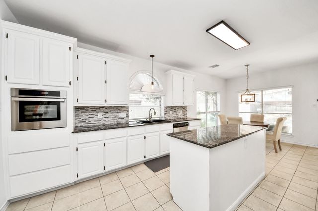 19702 Whitewind Drive, Houston, TX 77094