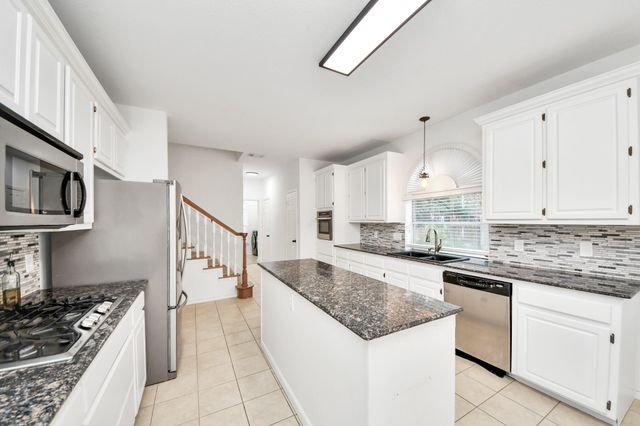 19702 Whitewind Drive, Houston, TX 77094