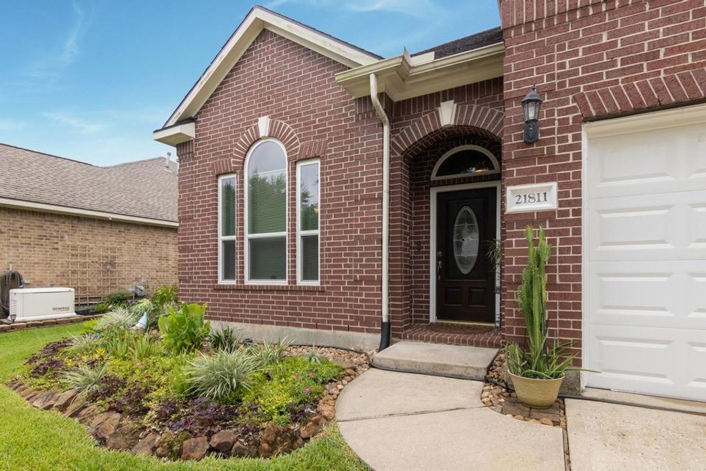 21811 Grand Lancelot Drive, Kingwood, TX 77339