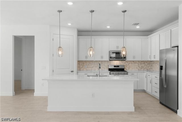 2104 Freemont WAY, Naples, FL 34120