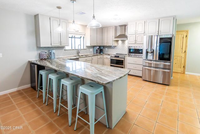 215 Moonlight Bay Drive, Panama City Beach, FL 32407