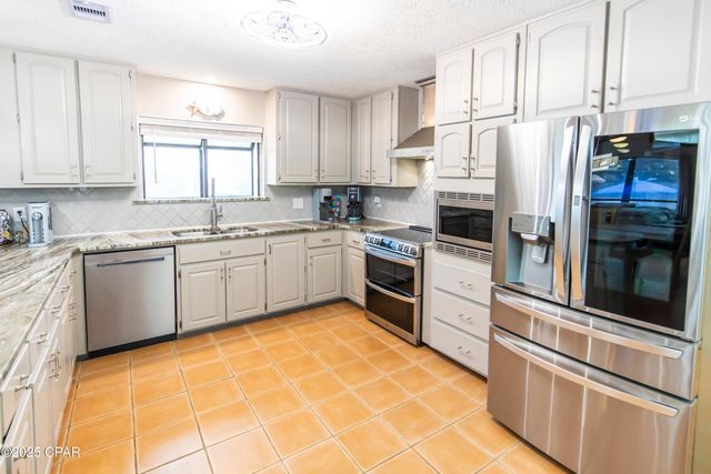 215 Moonlight Bay Drive, Panama City Beach, FL 32407