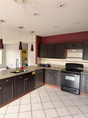 207 REDWOOD BARK TRAIL, Kissimmee, FL 34758