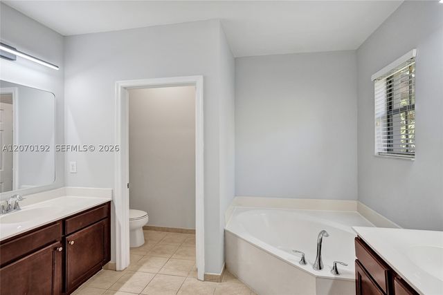 6079 Grand Cypress Cir W, Coconut Creek, FL 33073