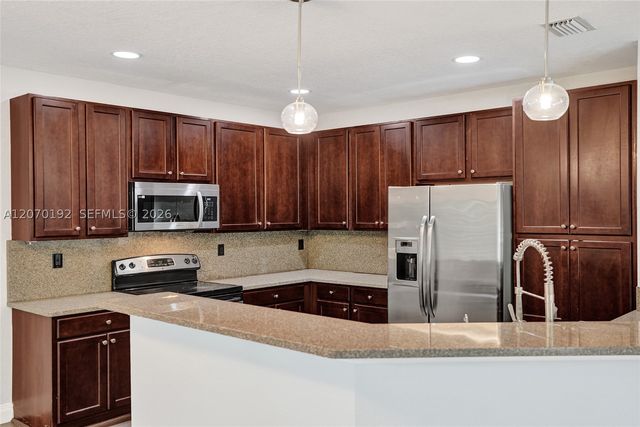 6079 Grand Cypress Cir W, Coconut Creek, FL 33073