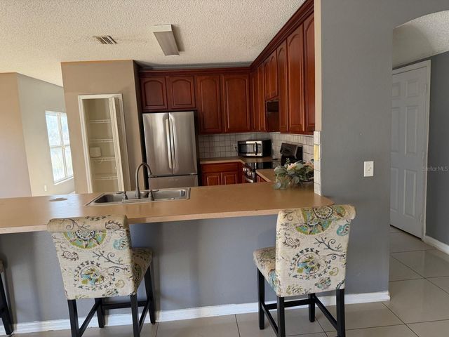 1403 KISSIMMEE COURT, Kissimmee, FL 34759