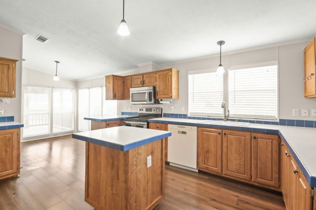 30935 Towering Oaks Drive, Magnolia, TX 77355