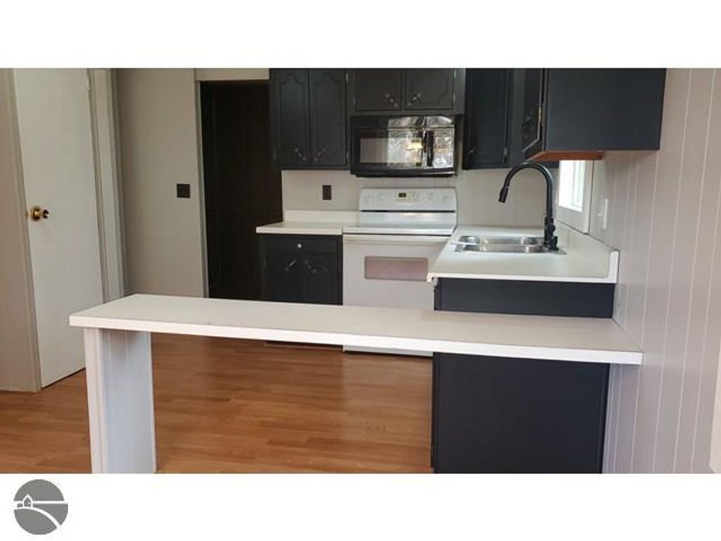 Image 8 of property listing at 502 S Broad Street, Harrison, MI 48625